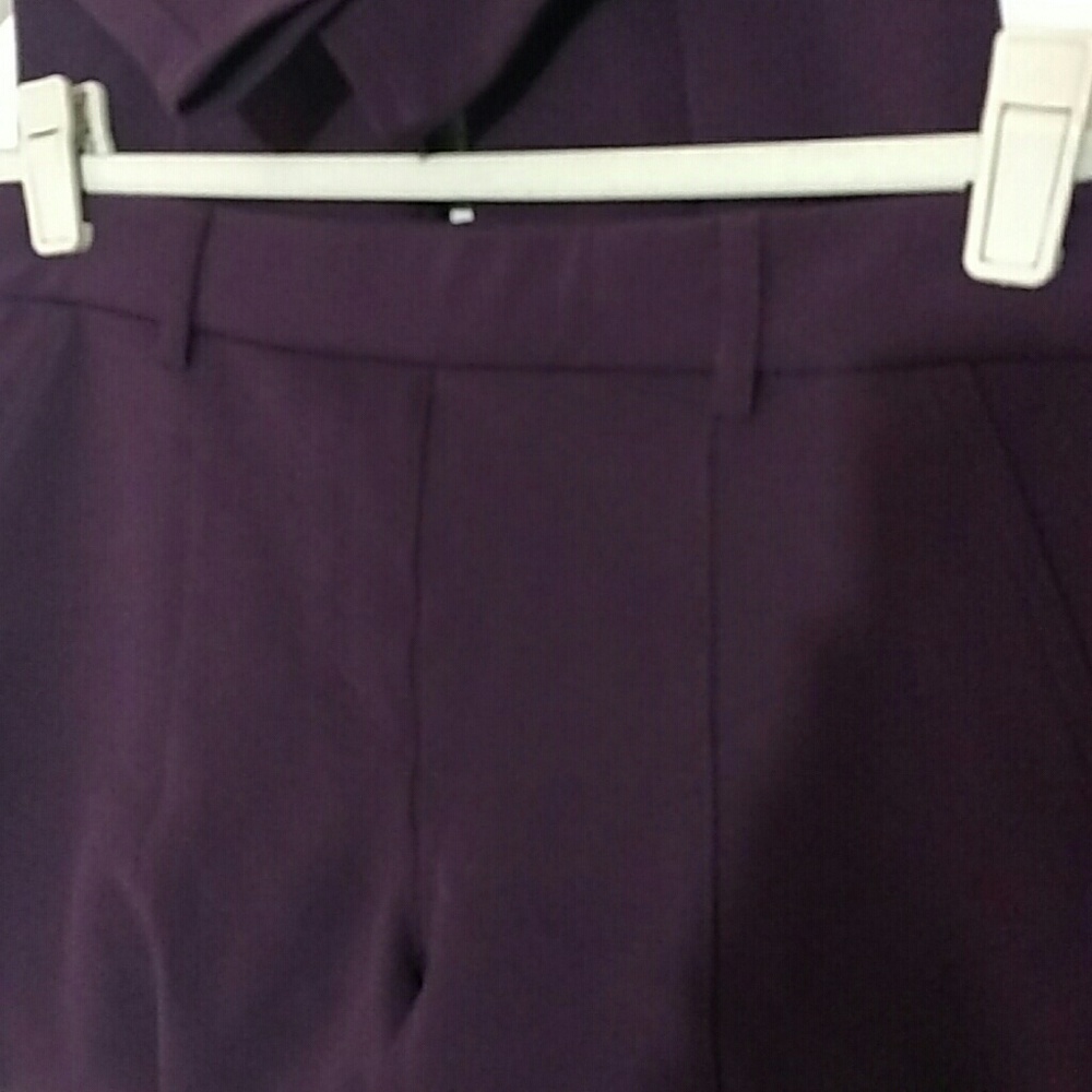 Express PLUM colored skinnys